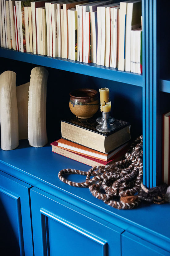 Traditional Tudor House bookshelf includes specific details